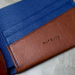 Saddle Brown Calfskin and Navy Chèvre Bifold