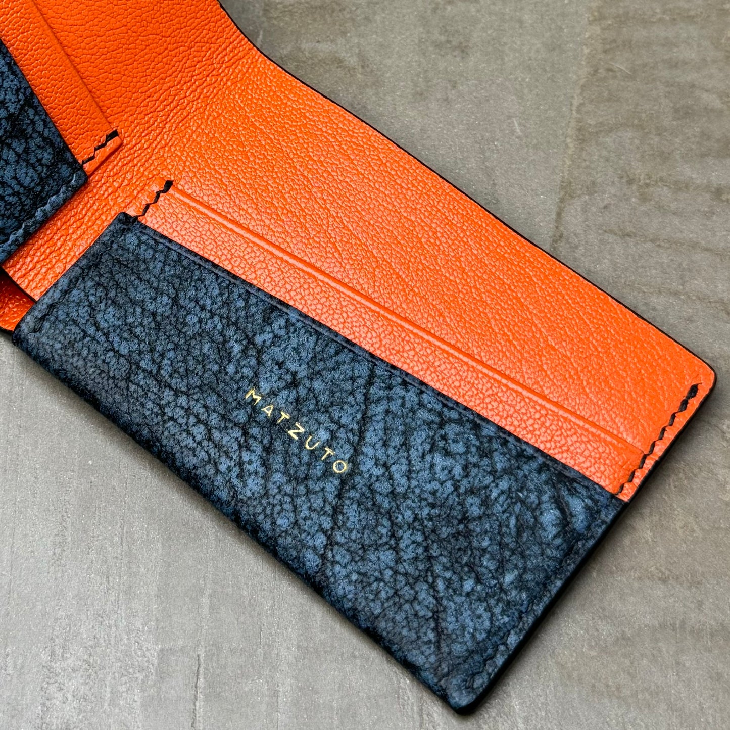 Cape Buffalo and Orange Chèvre Bifold