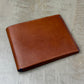 Saddle Brown Calfskin and Navy Chèvre Bifold